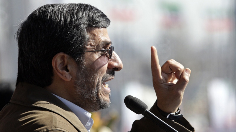 Iranian President Mahmoud Ahmadinejad gestures as he deliver his speech at a rally to mark the 33rd anniversary of the Islamic Revolution that toppled the country's pro-Western monarchy and brought Islamic clerics to power, Tehran, Saturday, Feb. 11, 2012. (AP Photo/Vahid Salemi)