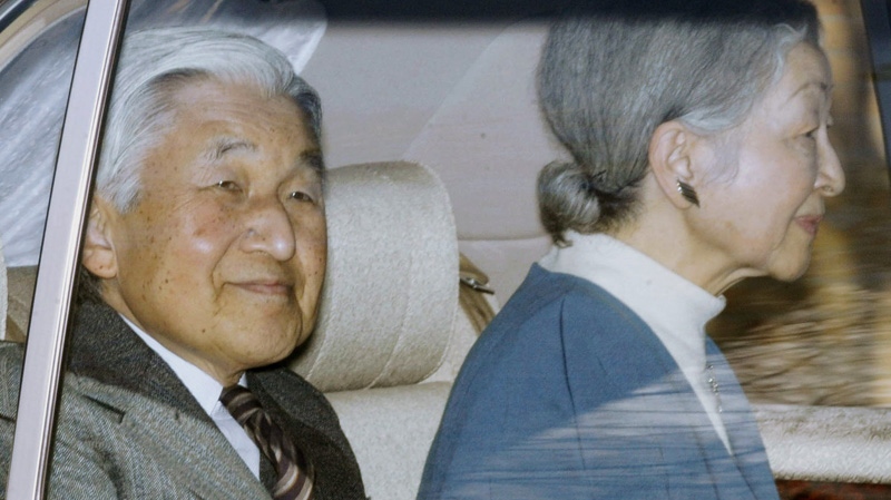 Japan's Emperor Akihito, left, accompanied by Empress Michiko, leave University of Tokyo Hospital after he received tests in Tokyo, Sunday, Feb. 12, 2012.