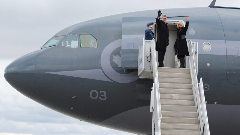 Prime Minister Stephen Harper departs with wife Laureen from Ottawa on Friday, November 11, 2011, on route to Honolulu, Hawaii.
