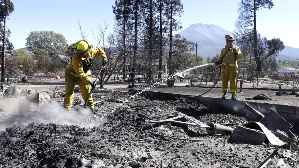 Fire crews clean up after California wildfire