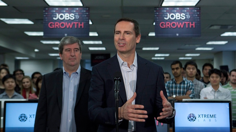  Ontario Premier Dalton McGuinty and Minister of Training Colleges and Universities Glen Murray address members of the media following a tour of Xtreme labs in Toronto on Tuesday, Feb. 14, 2012. (Pawel Dwulit  / THE CANADIAN PRESS)  