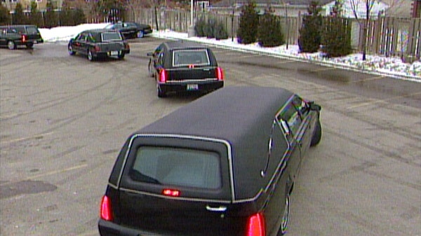 Hearses carrying nine of the men killed in a crash in Hampstead are seen departing the Henry Walser Funeral Home in Kitchener, Ont. on Wednesday, Feb. 15, 2012.