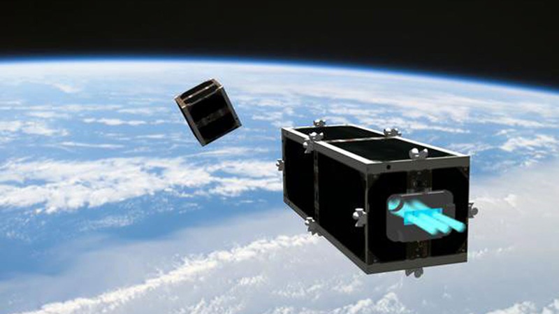 In this illustration provided by the Swiss Space Center of the Swiss Federal Institute of Technology (EPFL) on Wednesday, February 15, 2012, the CleanSpace One is chasing its target, one of the CubeSats launched by Switzerland in 2009. (AP Photo/HO/T EPFL/Swiss Space Center)
