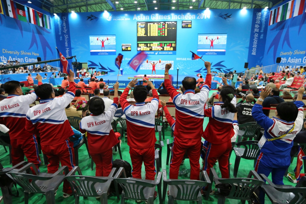 North Korean reps cheers teammate at Asian Games
