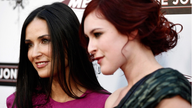 Demi Moore and Rumer Willis pose together at the premiere of 'The Joneses' in Los Angeles on Thursday, April 8, 2010. (AP / Matt Sayles)
