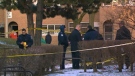 Investigators are shown at the scene of a shooting on Tandridge Crescent, Sunday, Feb. 19, 2012.