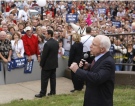 Republican presidential candidate Sen. John McCain addresses an overflow crowd of supporters outside a campaign rally in Lee's Summit, Mo., Monday, Sept. 8, 2008 (AP / Stephan Savoia)