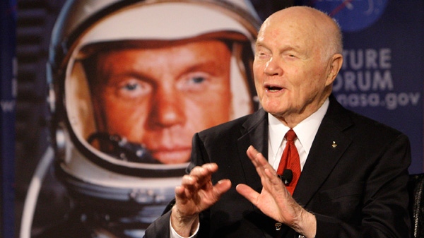Sen. John Glenn talks, via satellite, with the astronauts on the International Space Station, before the start of a roundtable discussion titled "Learning from the Past to Innovate for the Future" Monday, Feb. 20, 2012, in Columbus, Ohio. (AP / Jay LaPrete)