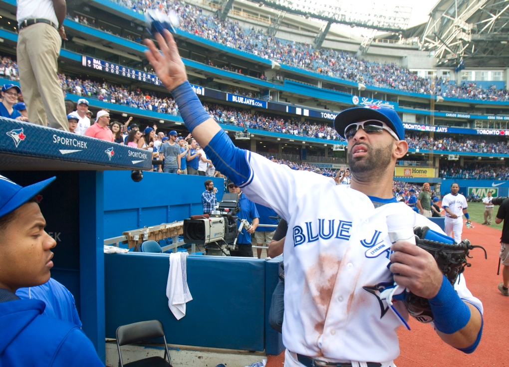 Jose Bautista throws gloves at Rogers Centre