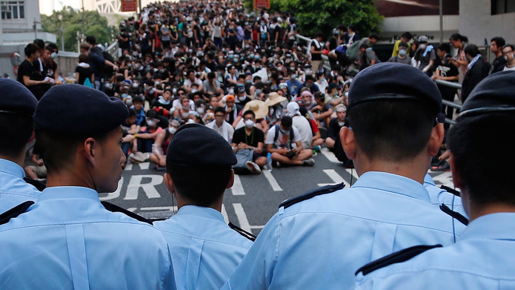 Protesters, police in Hong Kong