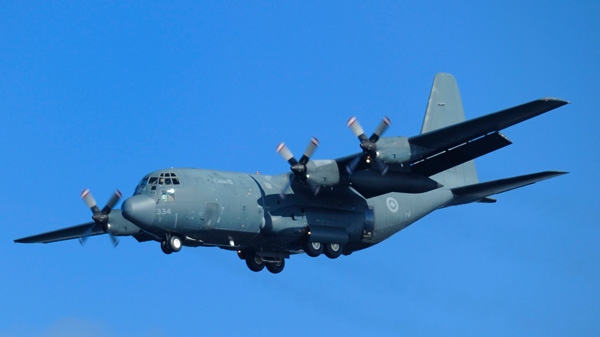 A CC-130 Hercules aircraft is seen during a caught fire during a search and rescue exercise, Sept. 28, 2011. (DND / Cpl Vincent Carbonneau)