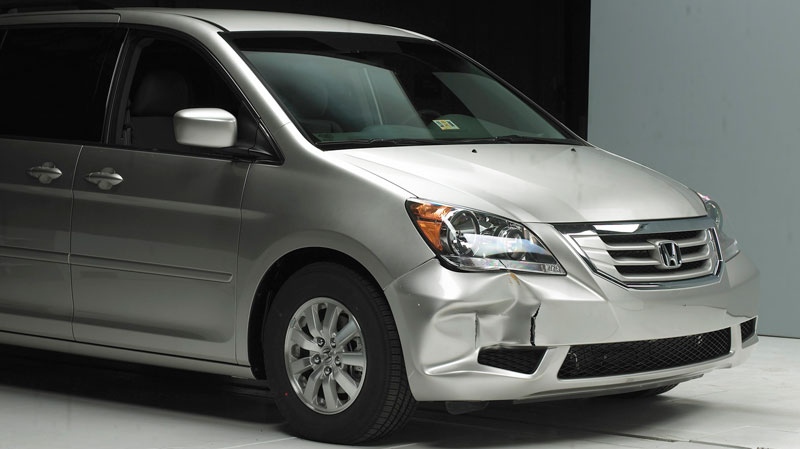 This undated handout photo provided by the Insurance Institute for Highway Safety shows front end damage on a 2008 Honda Odyssey. (AP / Insurance Institute for Highway Safety)