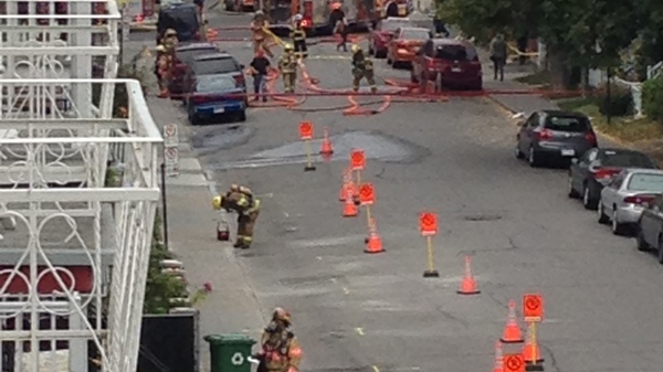 Firefighters try to find a gas leak