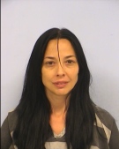 This Wednesday, Oct. 1, 2014, booking photo released by the Austin Police Department shows Dara Llorens, charged with aggravated kidnapping. (AP / Austin Police Department)