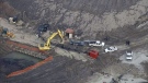 Police investigate the scene of a crane collapse that killed one person at a Whitby construction site on Thursday, Feb. 23, 2012.