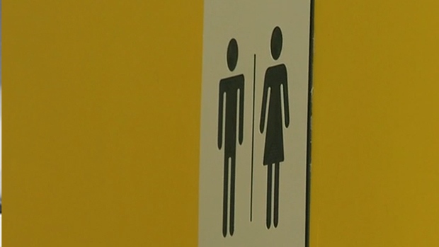 gender neutral washroom sign