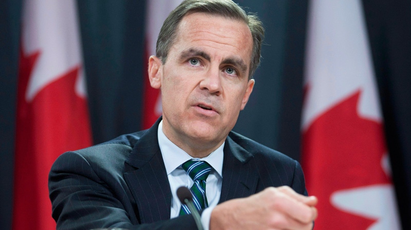 Bank of Canada Governor Mark Carney speaks with the media about the banks monetary policy report during a news conference in Ottawa Wednesday January 18, 2012. 