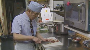 Edohei's owner Sadao Ono prepares food on the last day the 24-year-old business will operate in Winnipeg.