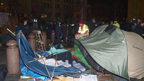 City of London Corporation bailiffs, backed by police, remove tents and other structures from the square in front of St Paul's Cathedral, where anti-capitalist protesters have been camped since mid-October, Tuesday, Feb. 28, 2012, in London. (AP / PA, Max Nash)