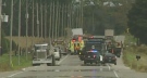 Emergency crews respond at the scene of a fatal crash on Medway Road northeast of London, Ont. on Monday, Oct. 6, 2014. (Wayne Jennings / CTV London)