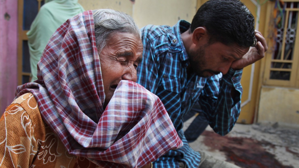 People mourn as India, Pakistan exchange fire