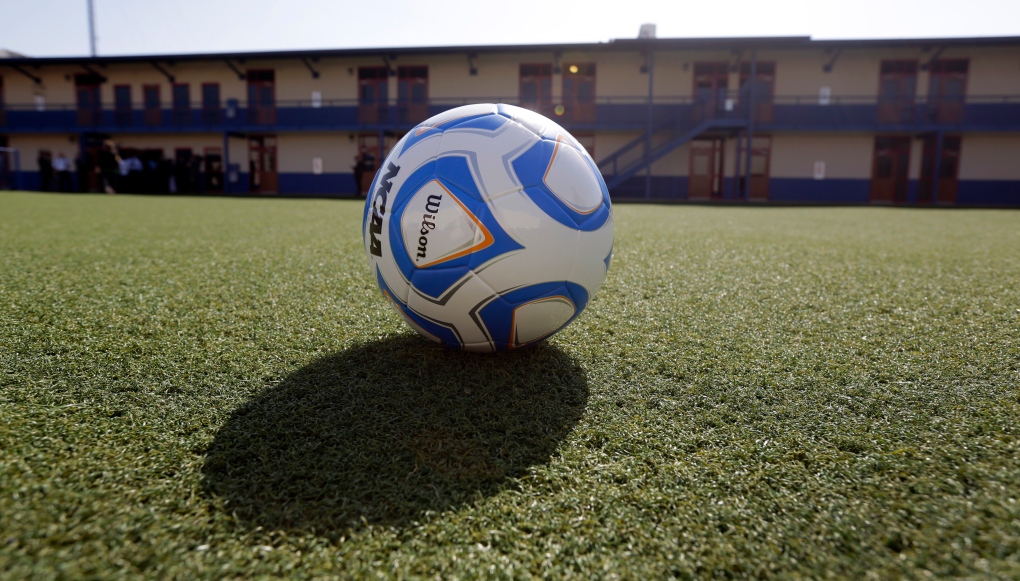 Soccer ball on artificial turf