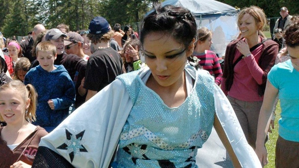 Shannen Koostachin dances at the Temiskaming Secondary School Pow Wow, in Temiskaming, Ontario in 2009. Tributes are pouring in for the 15-year-old aboriginal youth leader killed Monday, May 30, 2010, in a collision in Temagami. Koostachin won national attention as a Grade 8 student when she helped lead the fight to get Ottawa to build a grade school in Attawapiskat First Nation. (Handout / ND MP Charlie Angus)