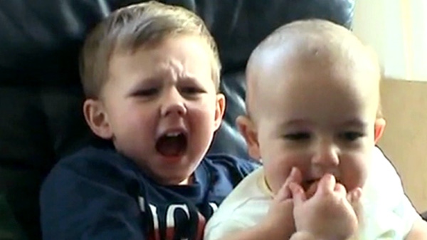 In this image taken from video Charlie is seen biting Harry's finger.