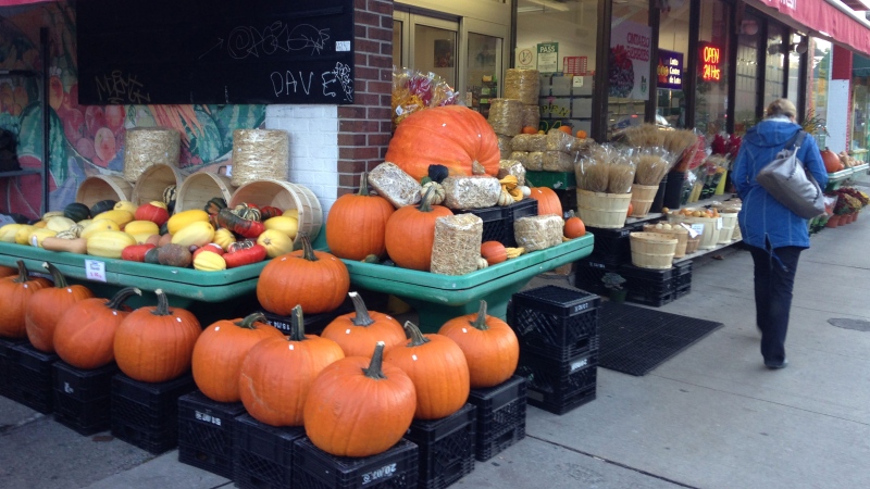 Pumpkins sit outside a market in Toronto on Thursday, Oct. 9, 2014. (George Stamou / CTV News)