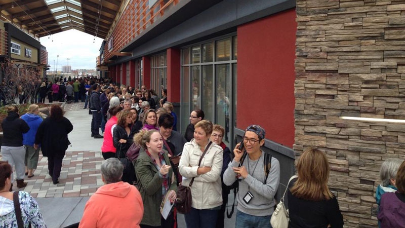 Thousands of shoppers attend Tanger Outlets grand opening on Friday, Oct. 17, 2014.