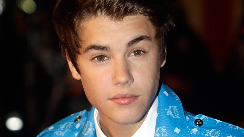 Justin Bieber arrives at the Cannes festival palace to attend the NRJ Music awards ceremony, in Cannes, southeastern France, Saturday, Jan. 28, 2012. (AP / Lionel Cironneau)