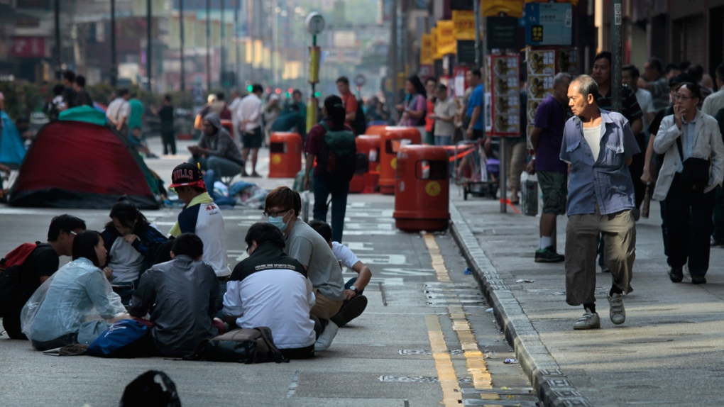 Pedestrians and protesters in Mong Kok, Hong Kong