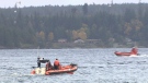 The Canadian Coast Guard launches a hovercraft to search for two men who went missing after their vessel capsized near Campbell River Saturday, Oct. 18, 2014. (CTV)