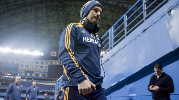 L.A. Galaxy's David Beckham leaves the pitch after a training session at the Rogers Centre in Toronto on Tuesday March 6, 2012, ahead of his team's CONCACAF quarter final first leg tie against Toronto FC tomorrow. THE CANADIAN PRESS/Chris Young