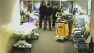 A surveillance video from the Civic campus of the Ottawa Hospital shows Kevin Gregson being escorted inside in handcuffs, Wednesday March 7, 2012. 