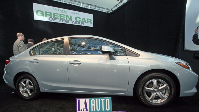 In this Nov. 17, 2011 file photo, the 2012 Honda Civic Natural Gas car, named Green Car of the Year for 2012, is displayed after its unveiling at press preview day for the Los Angeles Auto Show. (AP Photo/Reed Saxon, File)