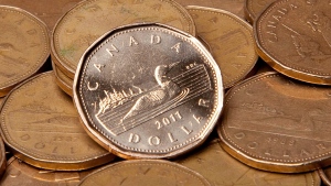 The Canadian dollar appears in this undated file photo. (Jonathan Hayward / THE CANADIAN PRESS)