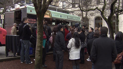 Vancouverites line up for food cart fare during the lunch rush. March 9, 2012. (CTV)