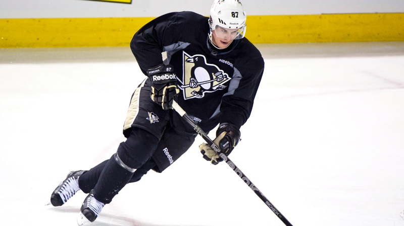 Pittsburgh Penguins' Sidney Crosby skates during hockey practice in Montreal, Tuesday, Feb. 7, 2012. (Paul Chiasson / THE CANADIAN PRESS)