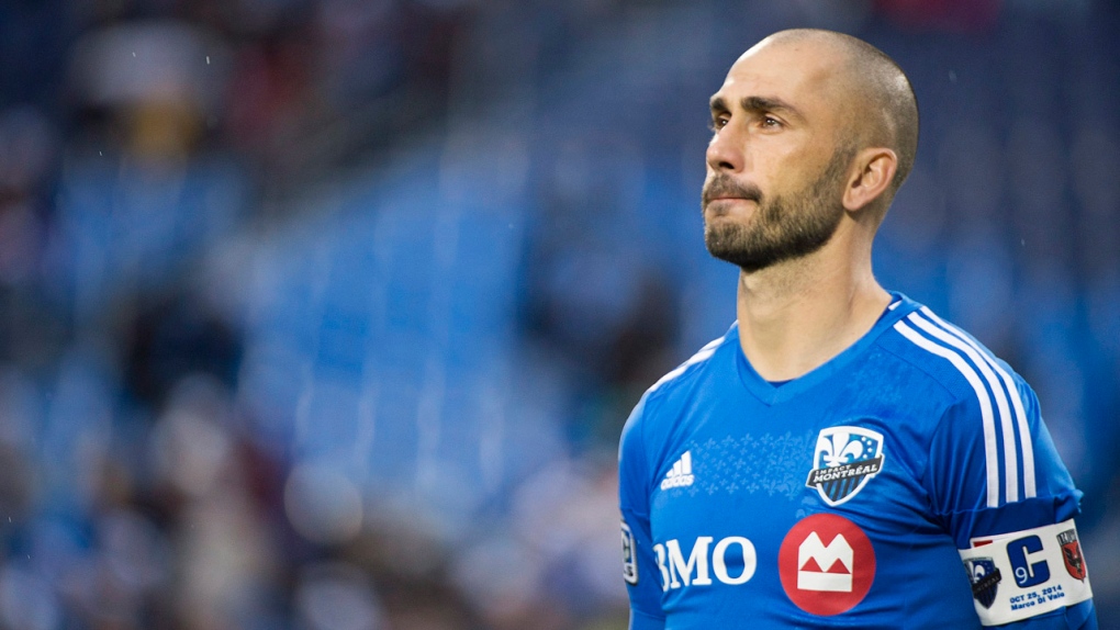 Montreal Impact's Marco Di Vaio watches a video