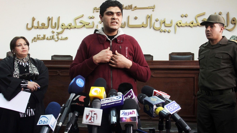 Egyptian Army Dr. Ahmed Adel, who was charged in the forced virginity tests case on Egyptian women protesters last year, speaks during a press conference at a military court in Cairo, Egypt, Sunday, March 11, 2012. 