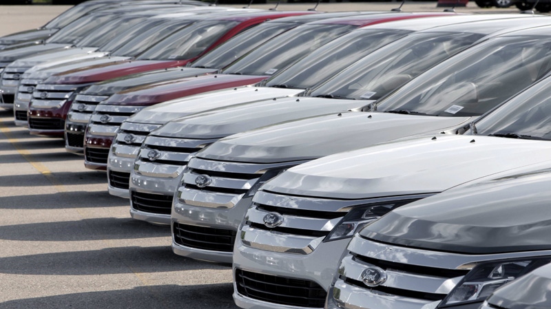 Ford Taurus' are shown on a dealership lot in Sterling Heights, Mich., Monday, Aug. 31, 2009. (AP Photo/Paul Sancya)