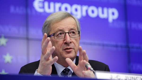 Luxembourg's Prime Minister Jean-Claude Juncker pauses before speaking during a media conference after a meeting of eurozone finance ministers at the EU Council buidling in Brussels on Monday, March 12, 2012. (AP / Virginia Mayo)