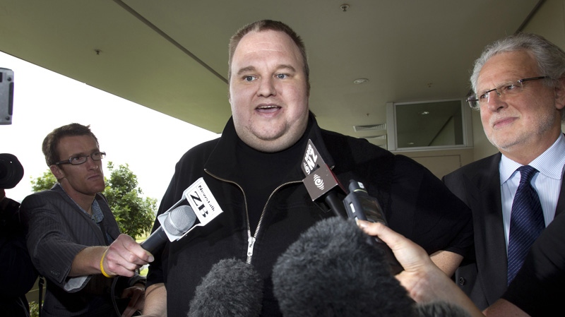 In this Feb. 22, 2012 file photo, Kim Dotcom, the founder of the file-sharing website Megaupload, comments after he was granted bail and released in Auckland, New Zealand. (AP Photo/New Zealand Herald, Brett Phibbs, File)