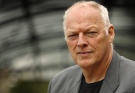 Former British Pink Floyd band member David Gilmour poses aboard his studio boat the 'Astoria' on the River Thames in London, on Wednesday, Aug. 13, 2008. (AP / Joel Ryan)
