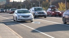 Ottawa Police set up a blitz to catch people illegally using the bus lane of Heron Rd. near Riverside Dr. The penalty is a $175 fine. (Photo: Jim O'Grady/CTV Ottawa)