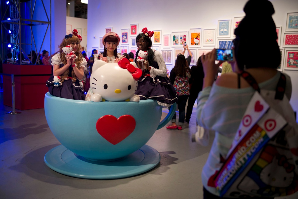 Hello Kitty fans pose at fan convention