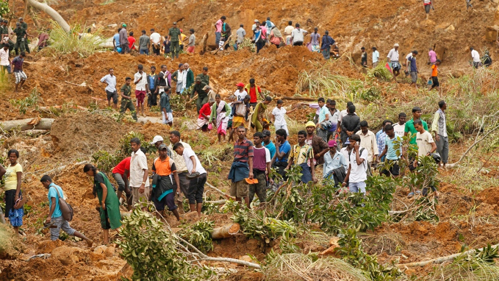 Sri Lankans search for mudslide survivors