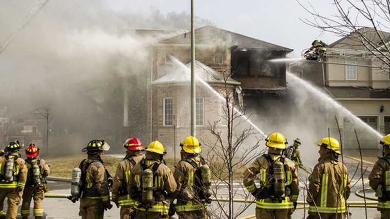MyNews contributor Jonatan Dan shared this photo of firefighters battling a house fire in Vaughan, Ont., on Thursday, March 15, 2012. (MyNews.CTV.ca /   Jonatan Dan )