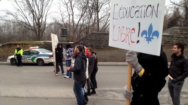 Gatineau university students block road to protest tuition hikes.